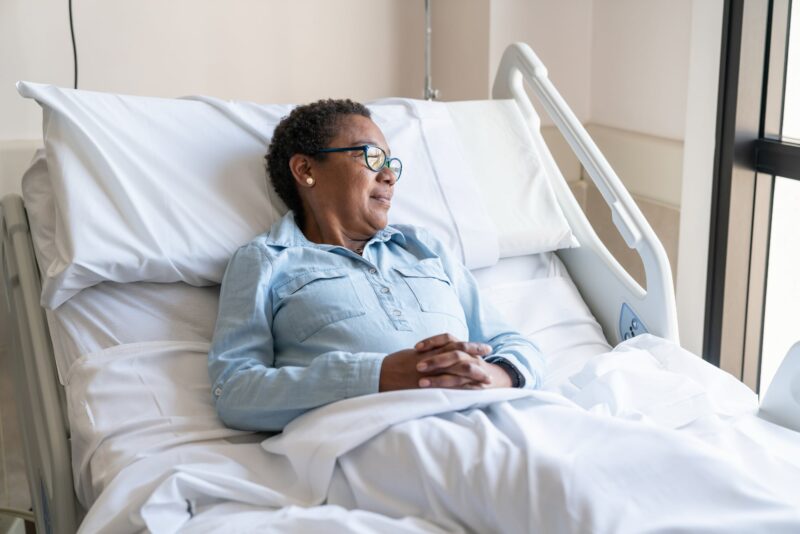 Lady in hospital bed