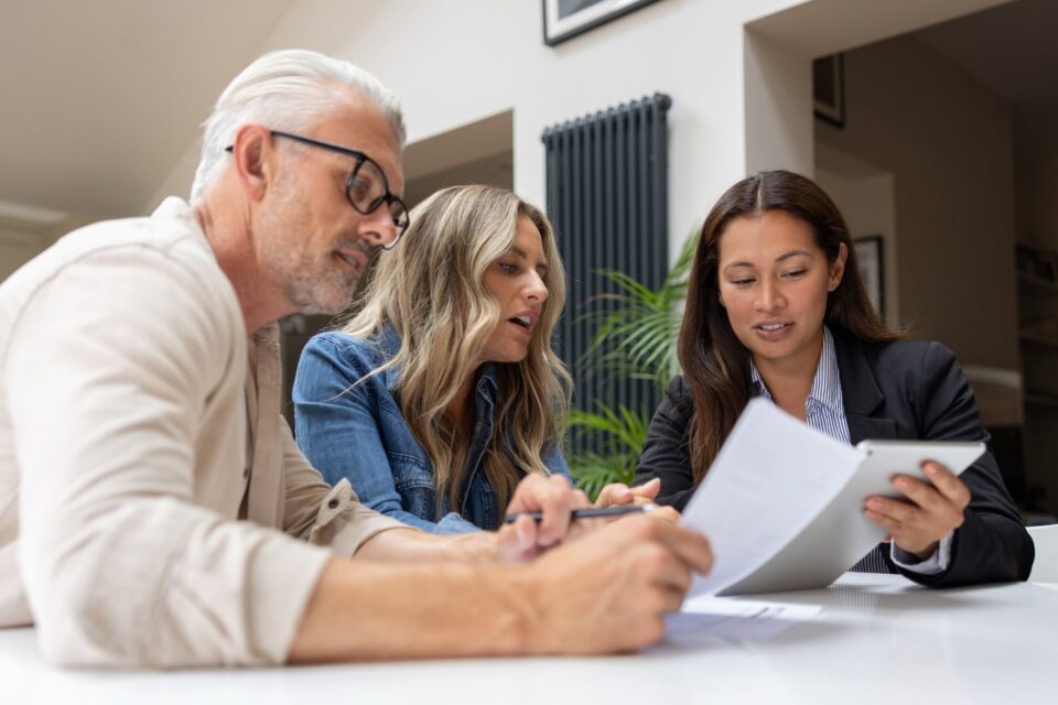 People looking at papers